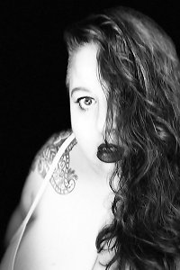 curvaceous woman enjoying passionate cuddling