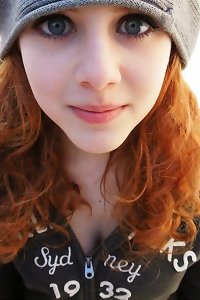 two plus-sized bombshells indulging in passionate lesbian embrace